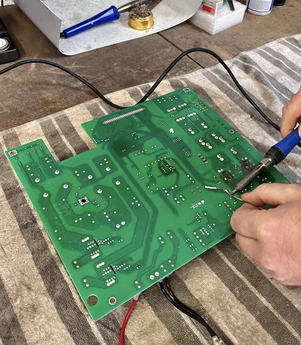 Solar inverter circuit board undergoing repair and inspection